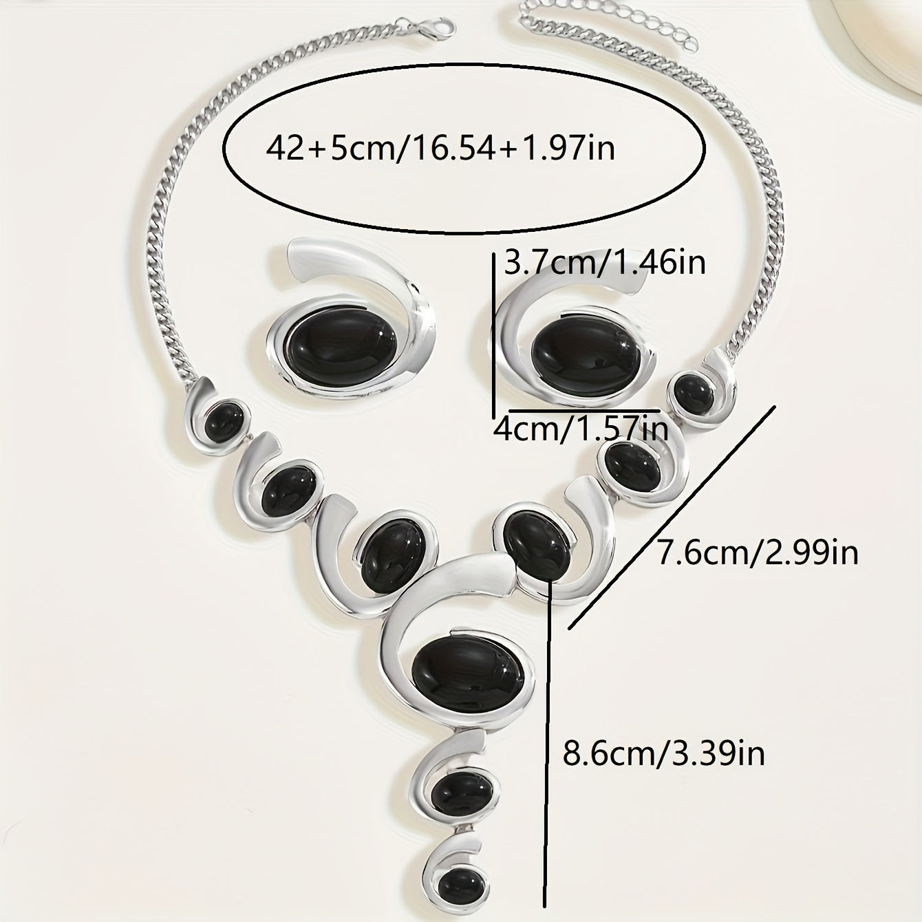 Two-piece Women's jewelry set: one spiral snail-shaped black rhinestone gradient Y-necklace and a pair of spiral snail-shaped black rhinestone earrings, classic versatile design for daily wear or party occasions